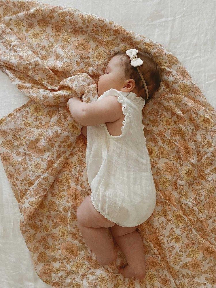Neutral Bloom Swaddle